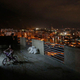 A girl rides her bike in Caracas's vertical slum Torre David
